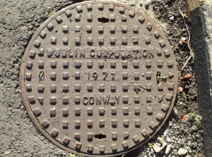 Sometimes I am walking over my own family history. This manhole cover in Dublin Docklands was cast in my grandfather's Iron-foundry at Inchicore where my uncles and father worked for many years, and where I also worked in the school holidays. Judging by the date, I might even have had a hand in making this one!. The foundry is long gone, but hundreds of Conway drains and covers remain on Irish streets, and will for many years to come.