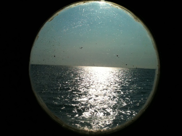 Let's look through . .the round window. Whatt do we see . . the empty sea.